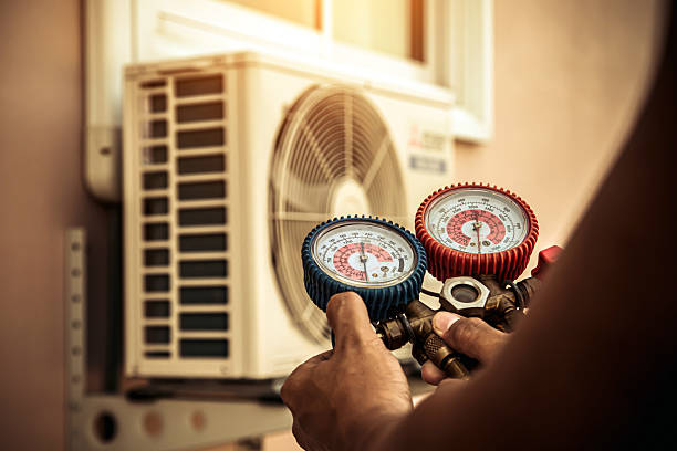 Professional Ac Installation technician working in Mulberry, AR